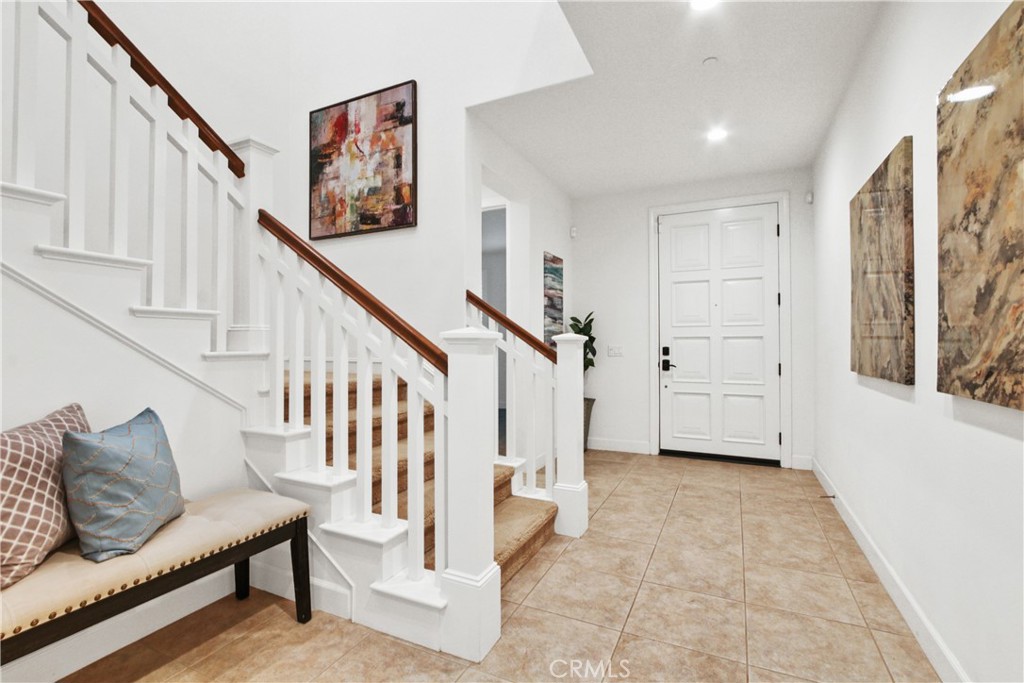 64 Hazelton Irvine, CA 92620 - Photo 2 of 23 a view of livingroom with furniture and stairs