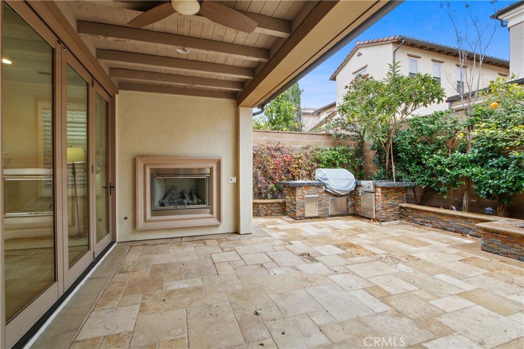 64 Hazelton Irvine, CA 92620 - Photo 21 of 23 a view of a porch with furniture and a yard