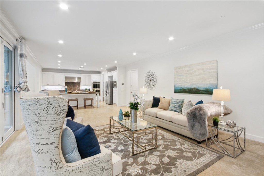 64 Hazelton Irvine, CA 92620 - Photo 5 of 23 a living room with furniture and a large window