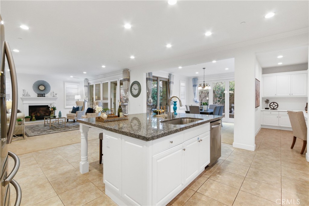 64 Hazelton Irvine, CA 92620 - Photo 8 of 23 a large kitchen with a lot of counter space and a sink