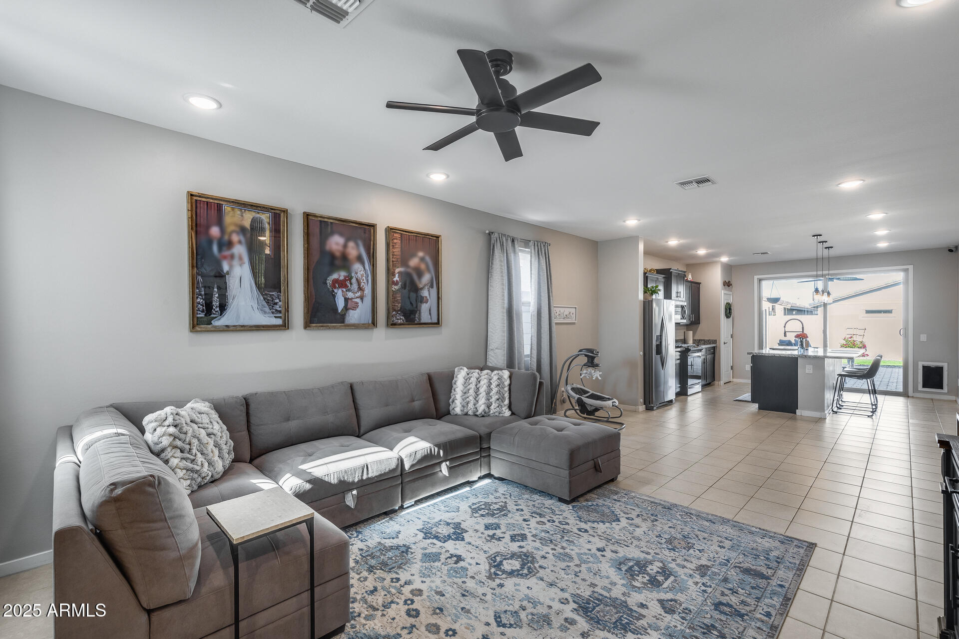 19920 West Rancho Drive Litchfield Park, AZ 85340 - Photo 10 of 49 a living room with furniture and a rug