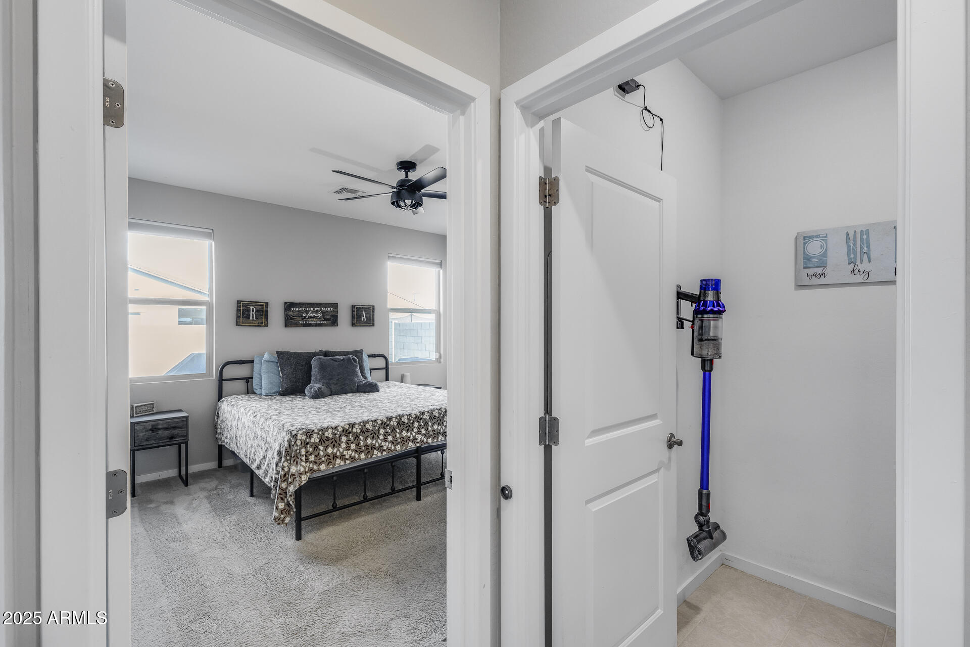 19920 West Rancho Drive Litchfield Park, AZ 85340 - Photo 21 of 49 a bedroom with furniture and a window