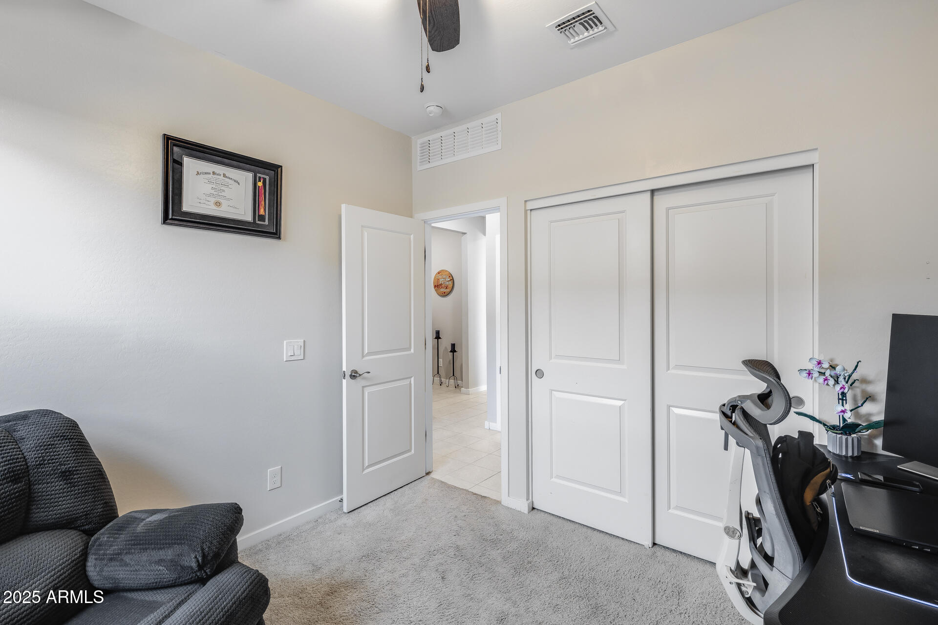 19920 West Rancho Drive Litchfield Park, AZ 85340 - Photo 25 of 49 a livingroom with a couch