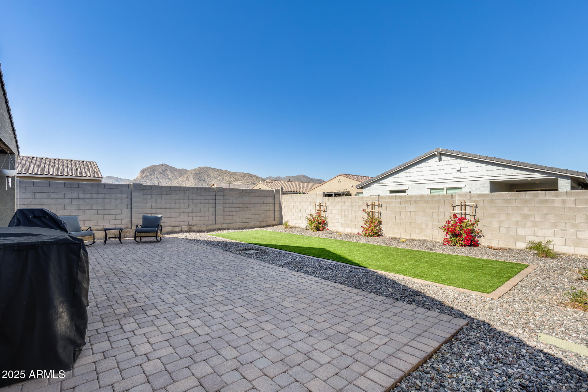 19920 West Rancho Drive Litchfield Park, AZ 85340 - Photo 38 of 49 a view of a backyard with potted plants