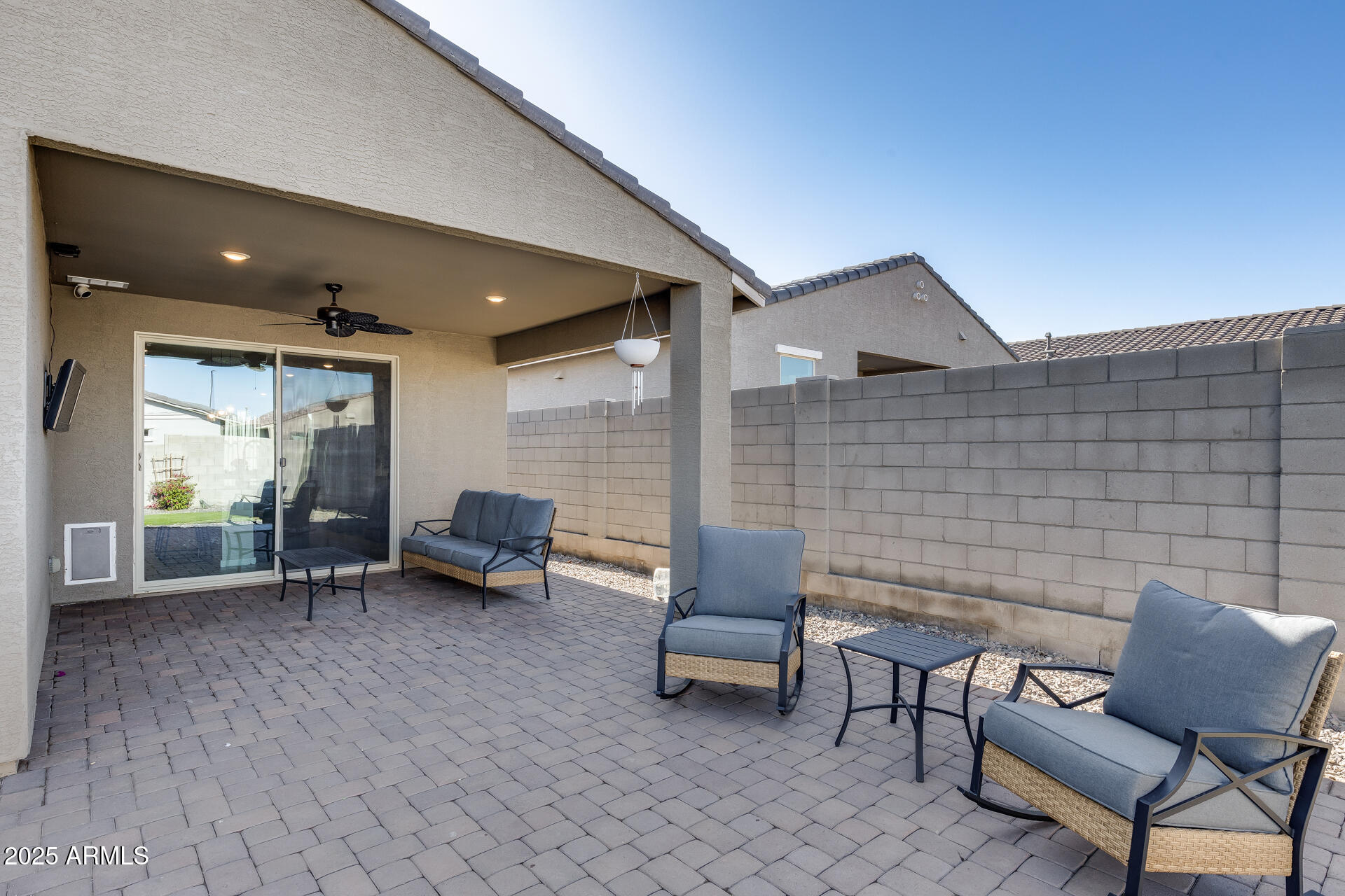 19920 West Rancho Drive Litchfield Park, AZ 85340 - Photo 40 of 49 a backyard of a house with outdoor seating