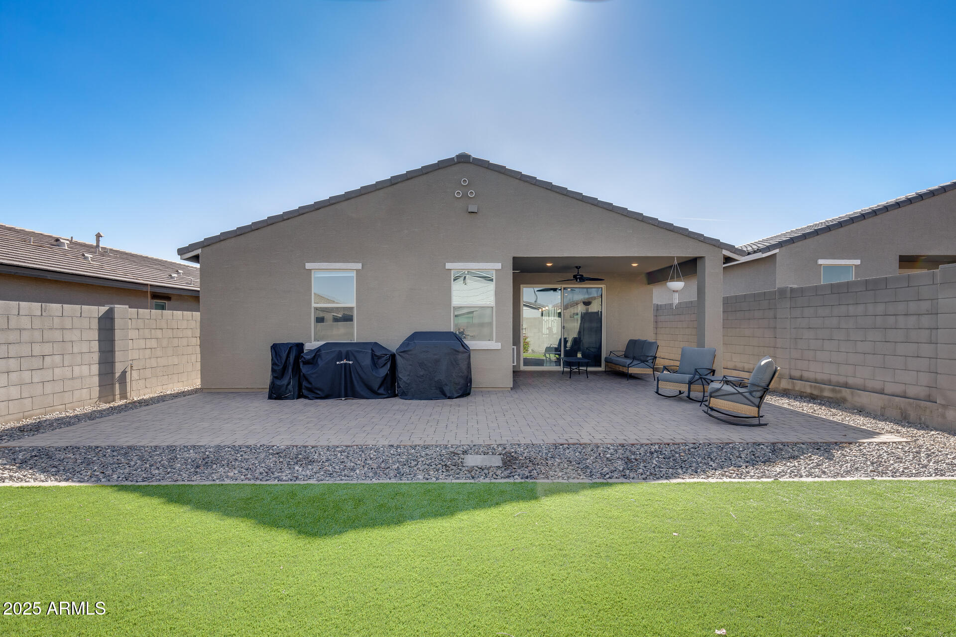 19920 West Rancho Drive Litchfield Park, AZ 85340 - Photo 43 of 49 a view of a house with backyard porch and sitting area