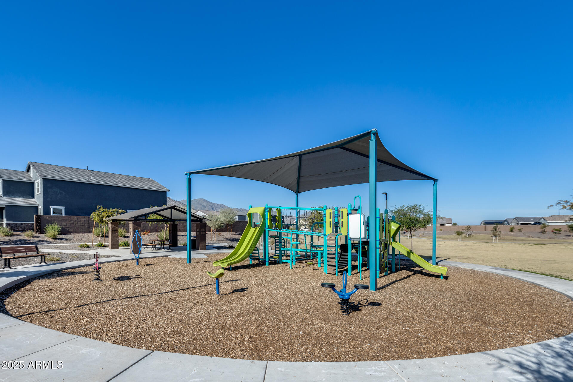 19920 West Rancho Drive Litchfield Park, AZ 85340 - Photo 48 of 49 a view of a park with slide
