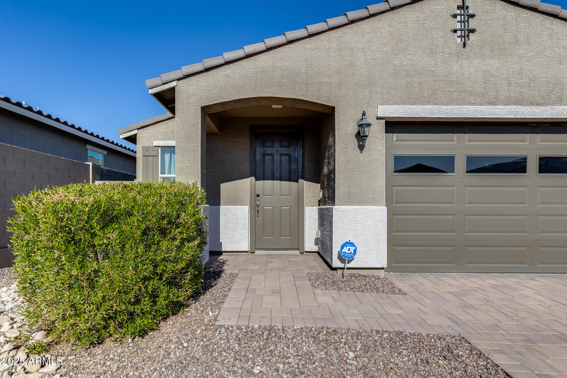 19920 West Rancho Drive Litchfield Park, AZ 85340 - Photo 8 of 49 a front view of a house with a yard