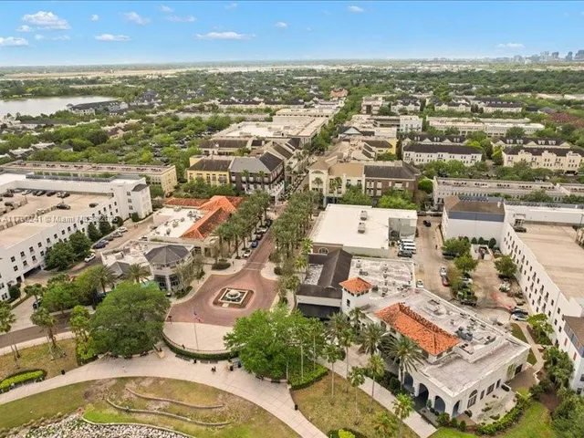 an aerial view of a city with lots of residential buildings