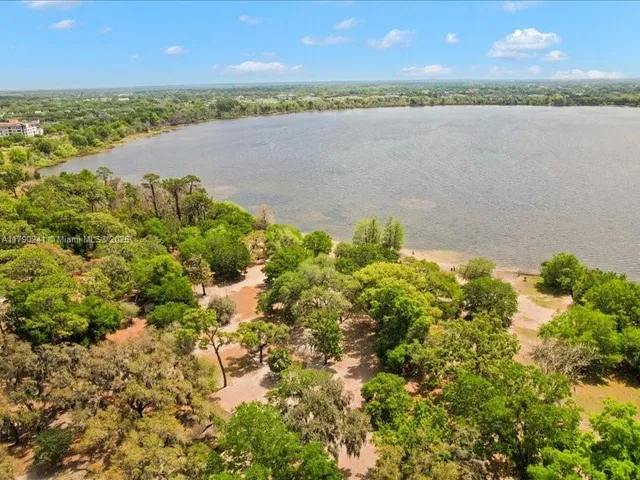 a view of a lake with a city
