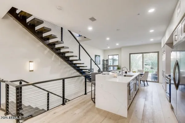 a view of a living room and dining room