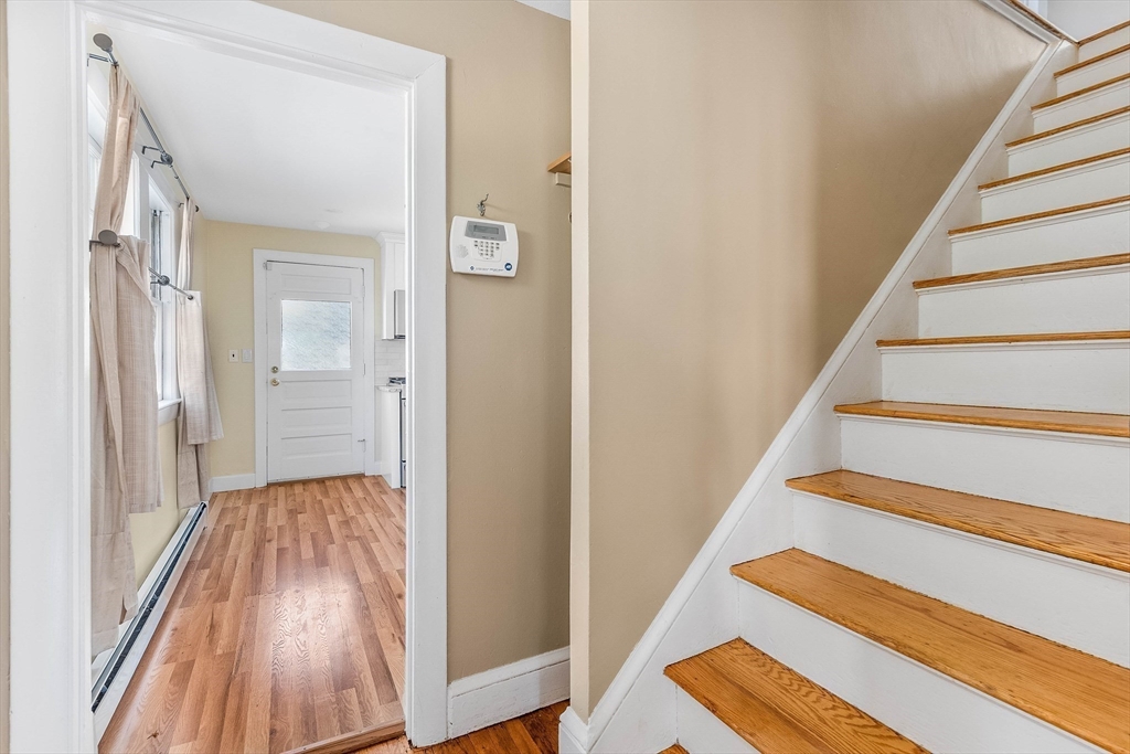 1 Columbia Terrace Dedham, MA 02026 - Photo 18 of 24 a view of a hallway with wooden floor and entryway