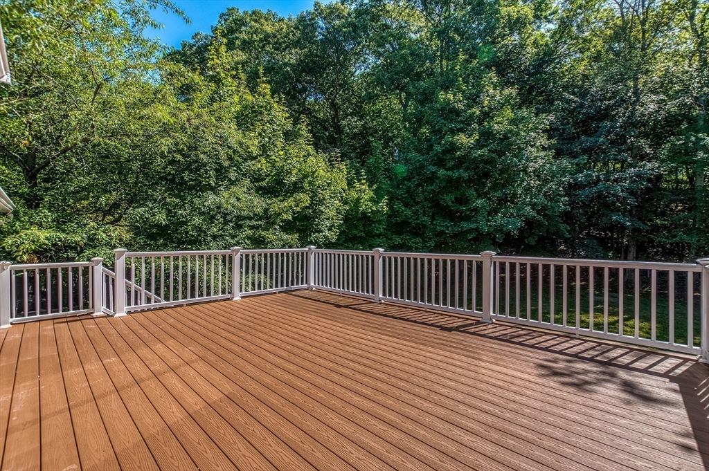 1 Columbia Terrace Dedham, MA 02026 - Photo 19 of 24 a view of deck with wooden floor and fence