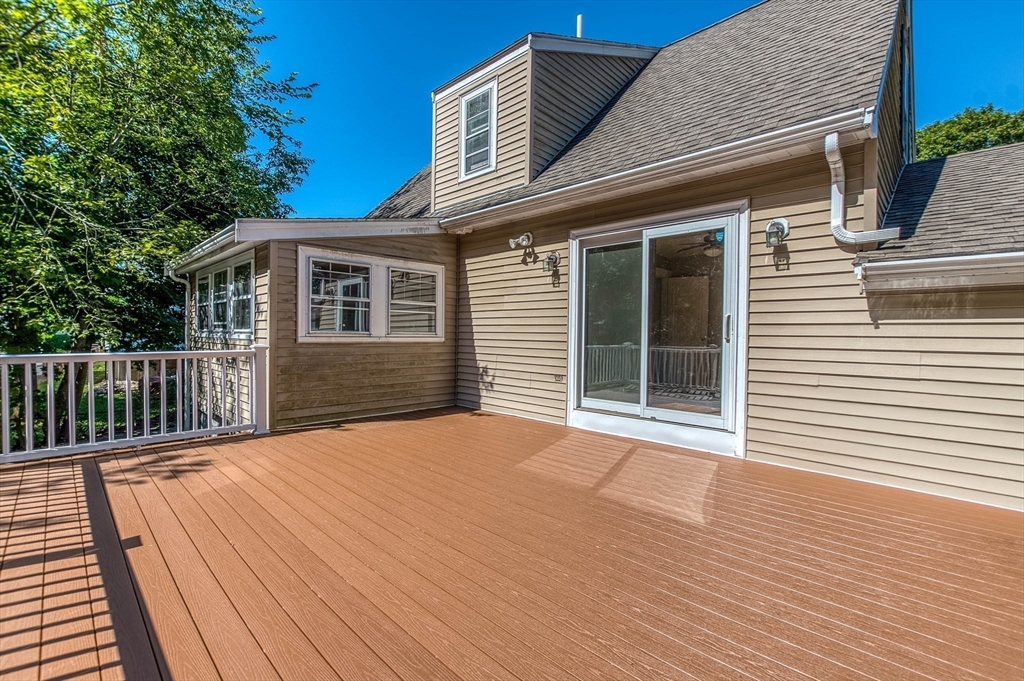 1 Columbia Terrace Dedham, MA 02026 - Photo 20 of 24 a view of backyard with deck and wooden floor