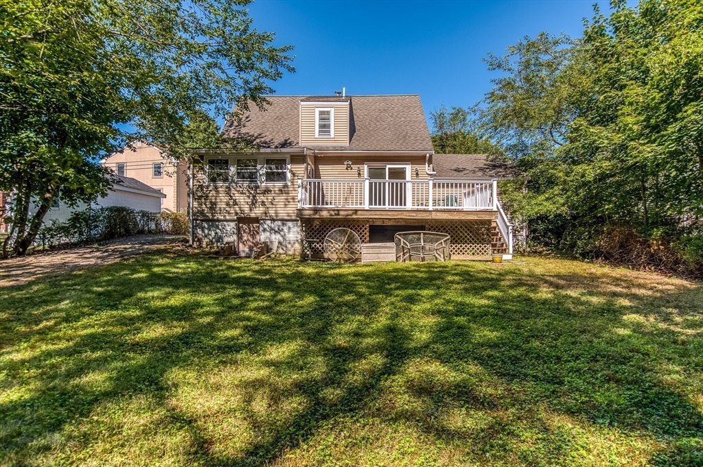 1 Columbia Terrace Dedham, MA 02026 - Photo 21 of 24 a view of a house with a yard