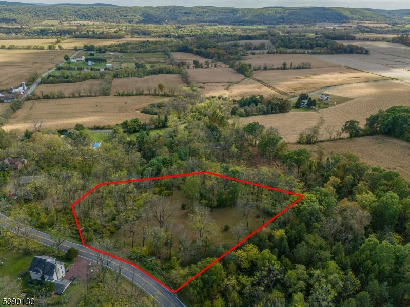an aerial view of a houses with outdoor space