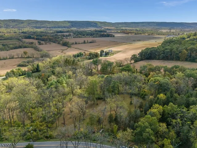a view of an ocean and a mountain