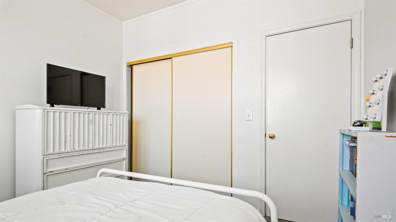 1532 Pinebrook Place Santa Rosa, CA 95403 - Photo 17 of 20 a bedroom with a bed and a flat screen tv