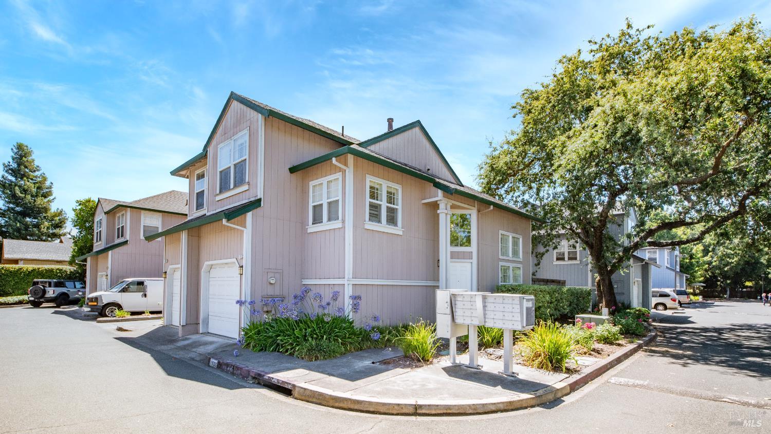 1532 Pinebrook Place Santa Rosa, CA 95403 - Photo 2 of 20 a front view of a house with a yard and potted plants