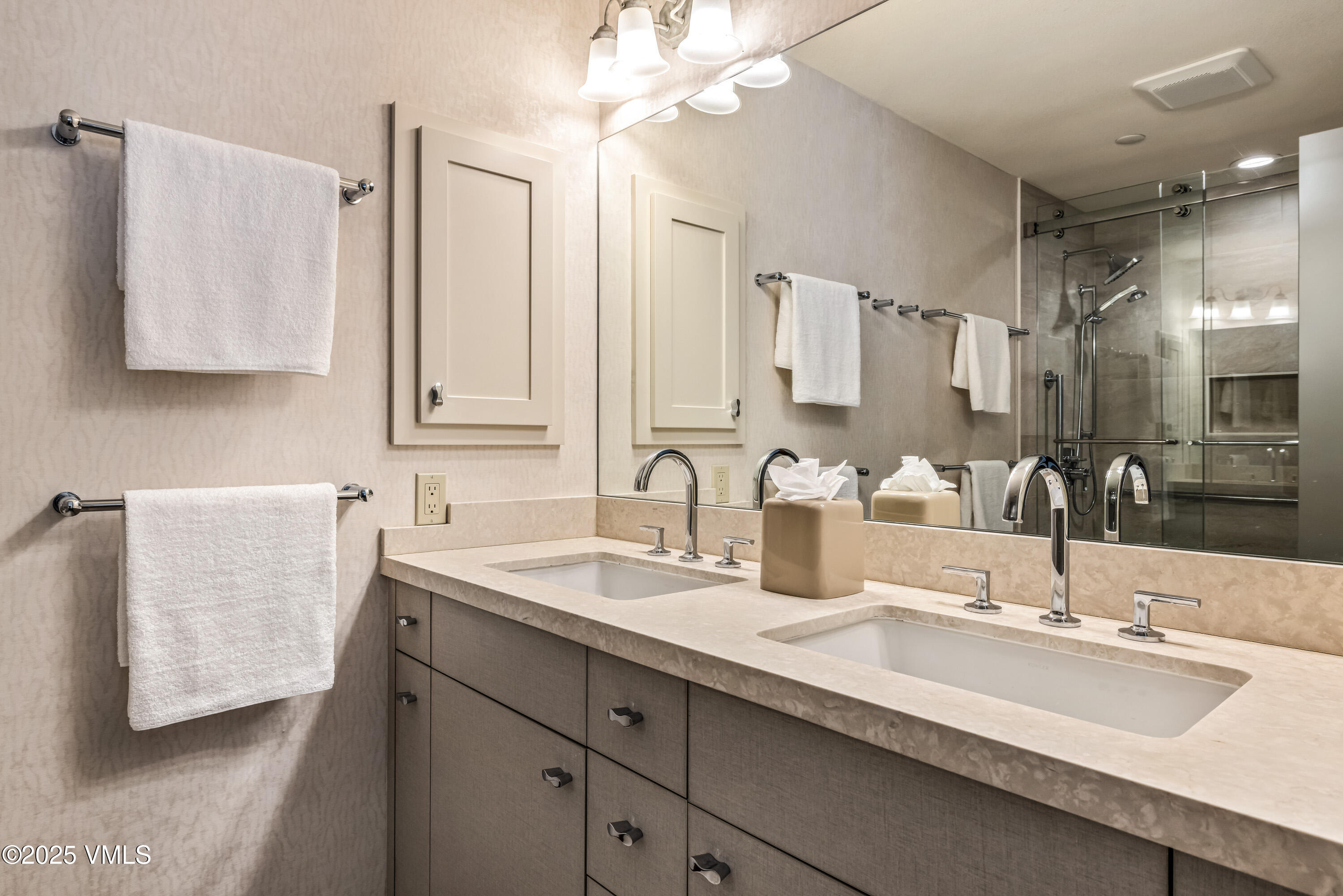 355 Offerson Road, Unit P4 Beaver Creek, CO 81620 - Photo 20 of 43 a bathroom with a sink double vanity and a mirror