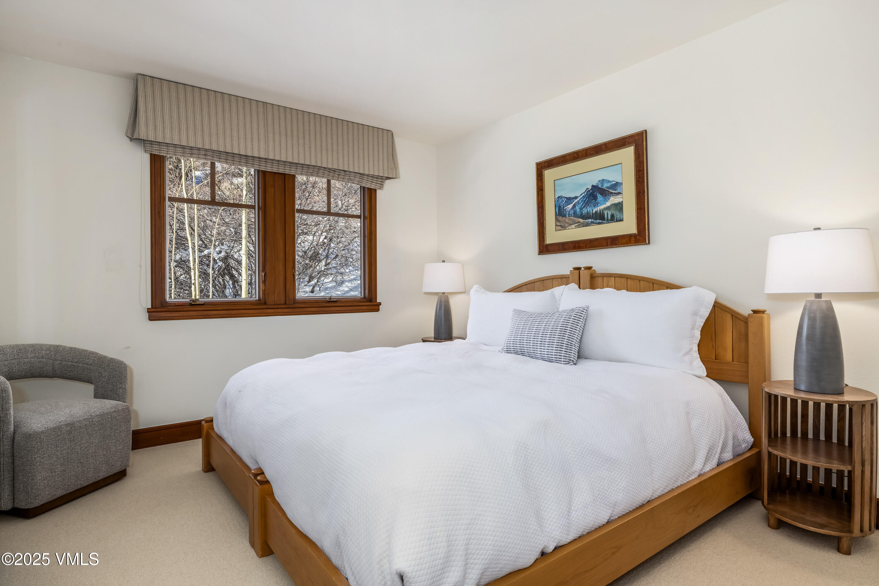 355 Offerson Road, Unit P4 Beaver Creek, CO 81620 - Photo 24 of 43 a bedroom with a bed a couch and a window