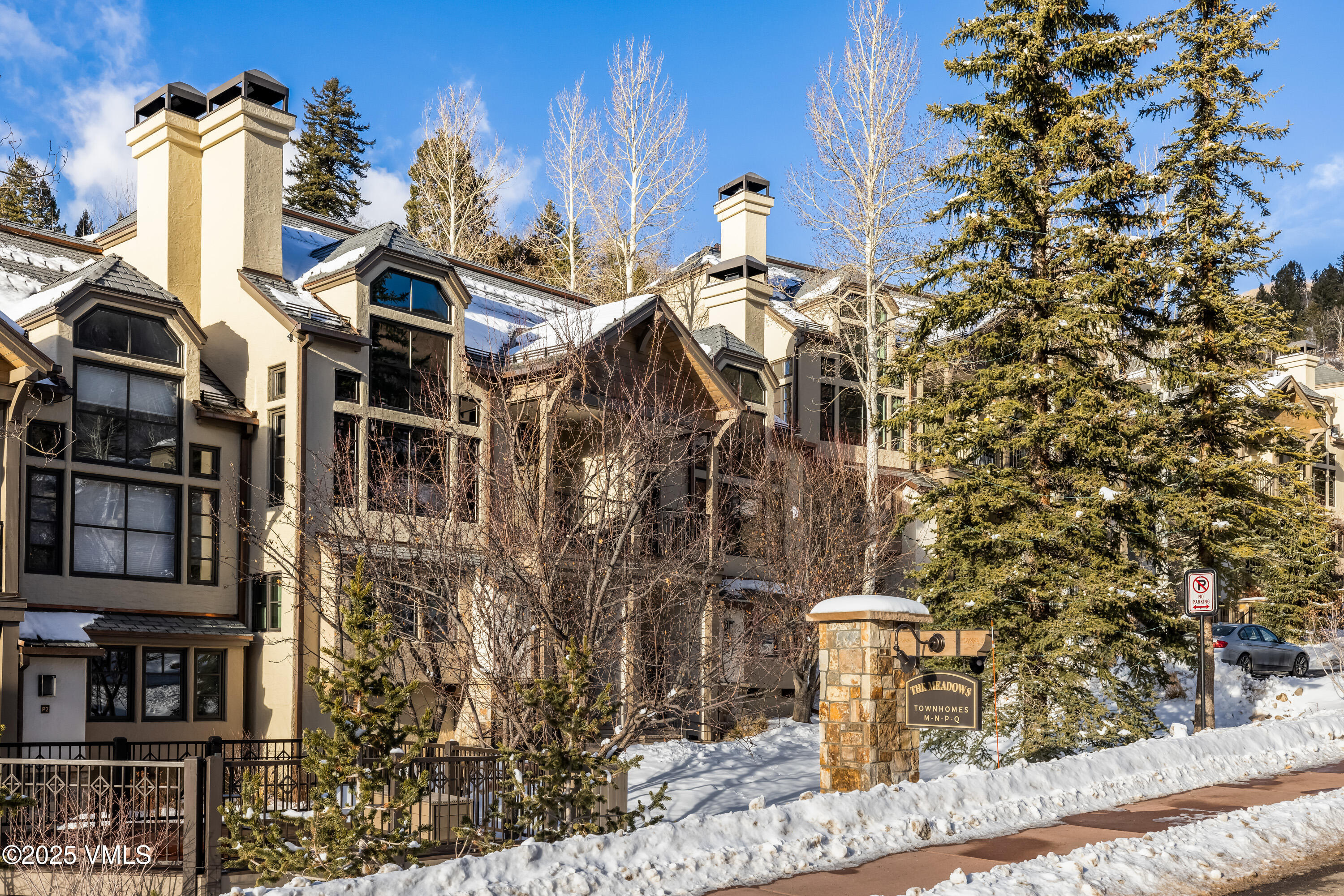 355 Offerson Road, Unit P4 Beaver Creek, CO 81620 - Photo 33 of 43 a view of a brick house with many windows