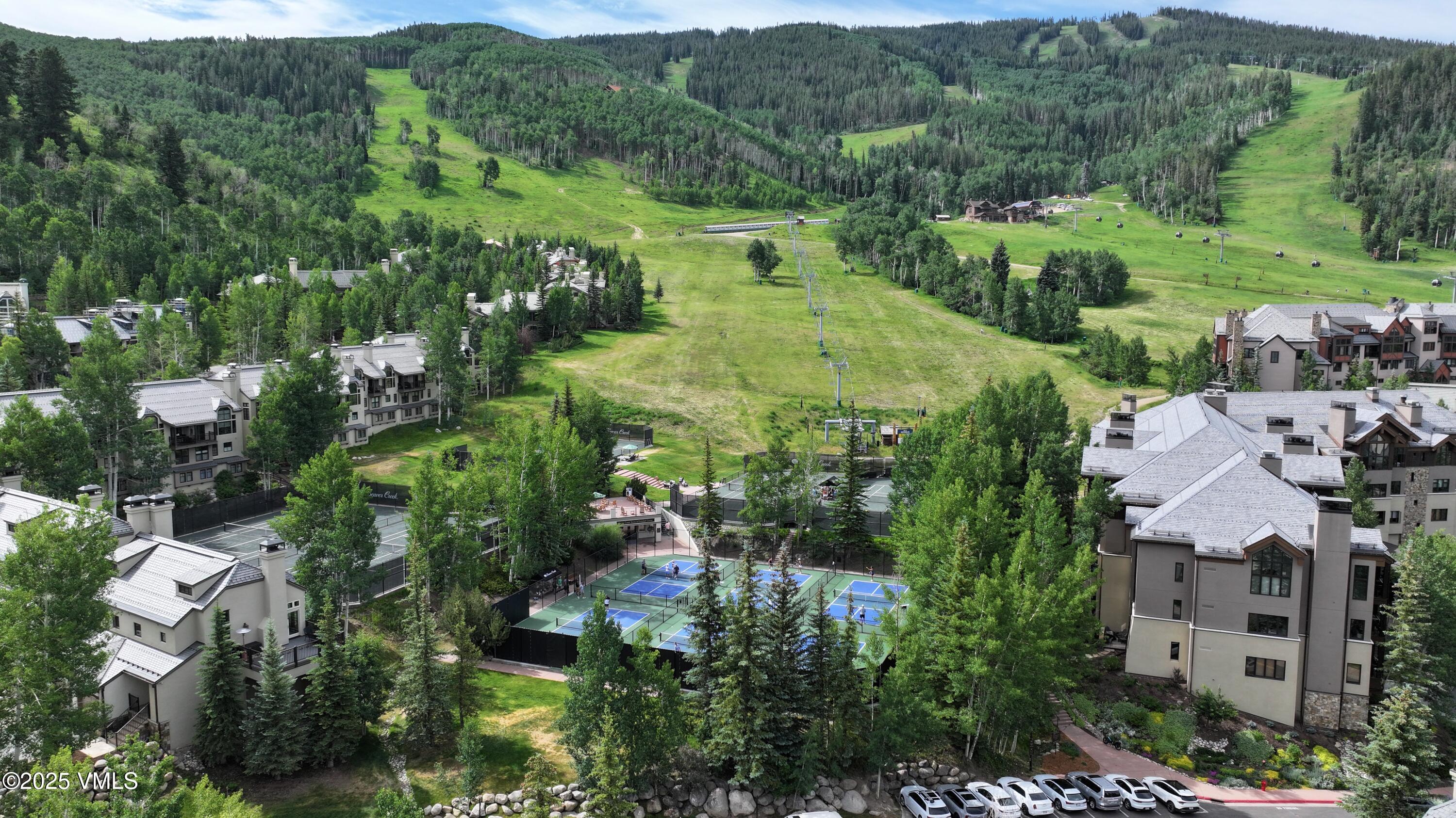 355 Offerson Road, Unit P4 Beaver Creek, CO 81620 - Photo 40 of 43 an aerial view of multiple house with a yard