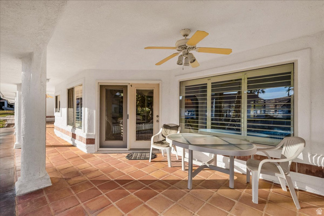 150 South Crystal Street, Unit 31 St. George, UT 84770 - Photo 4 of 20 View of patio featuring a ceiling fan and outdoor dining area