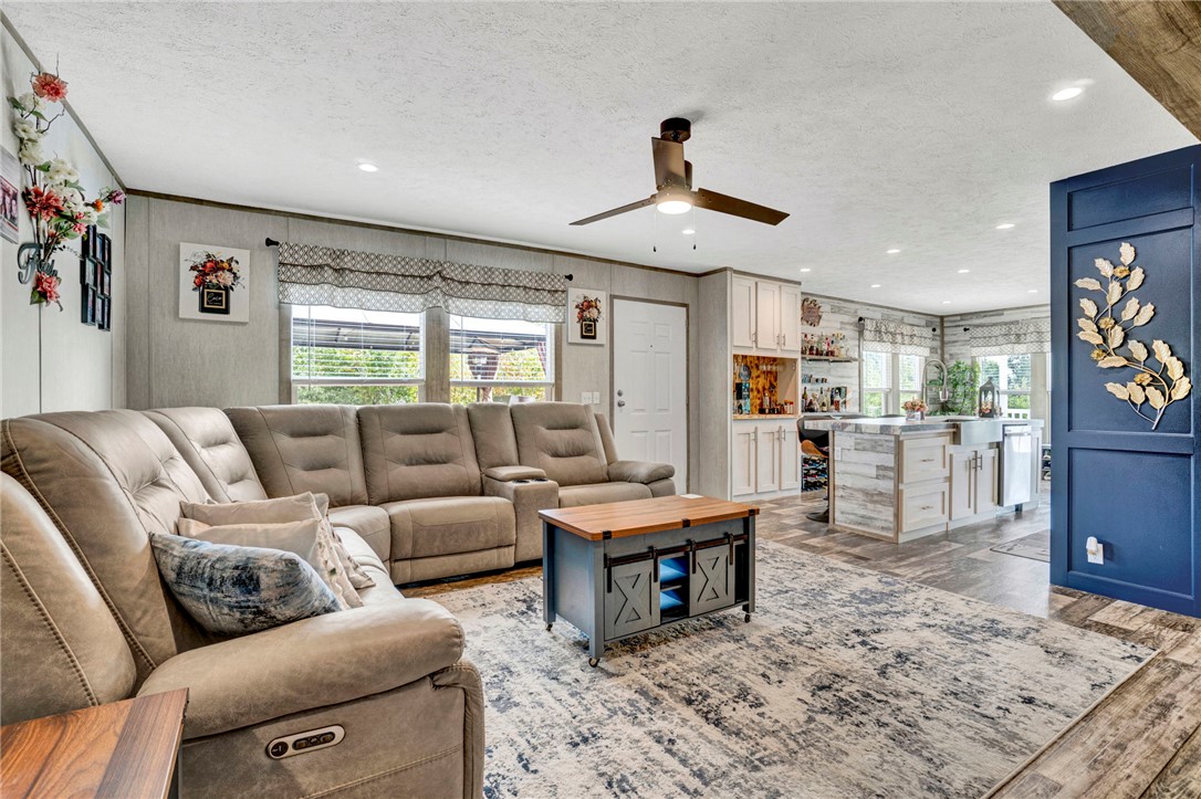 2655 State Rd S-4-108 Anderson, SC 29624 - Photo 37 of 37 An open floor plan seamlessly connects the comfortable living area to a modern kitchen space.