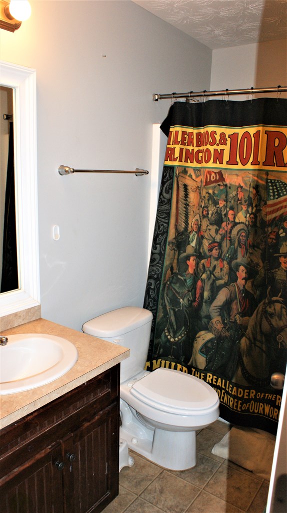 398 Owens Road Fort Mitchell, AL 36856 - Photo 12 of 17 a bathroom with a sink and a toilet