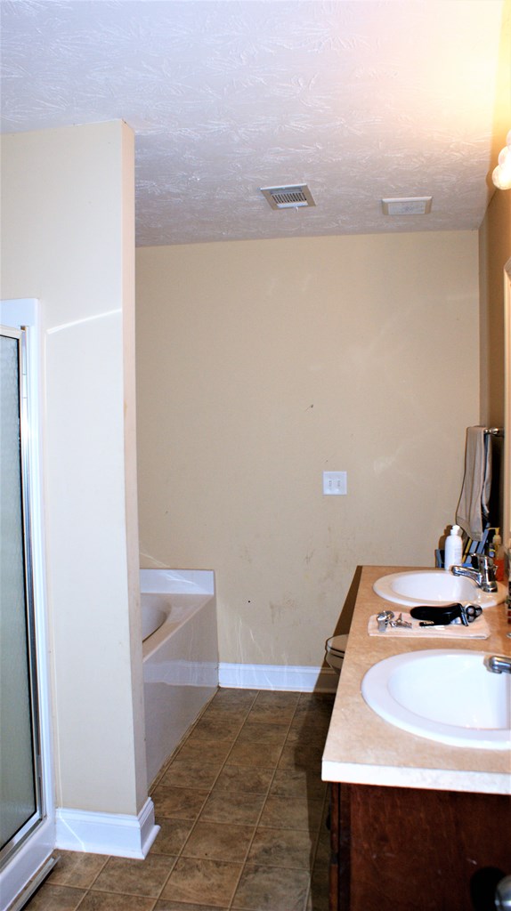398 Owens Road Fort Mitchell, AL 36856 - Photo 7 of 17 a bathroom with a sink and a mirror