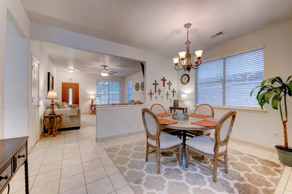 a view of a dining room with furniture