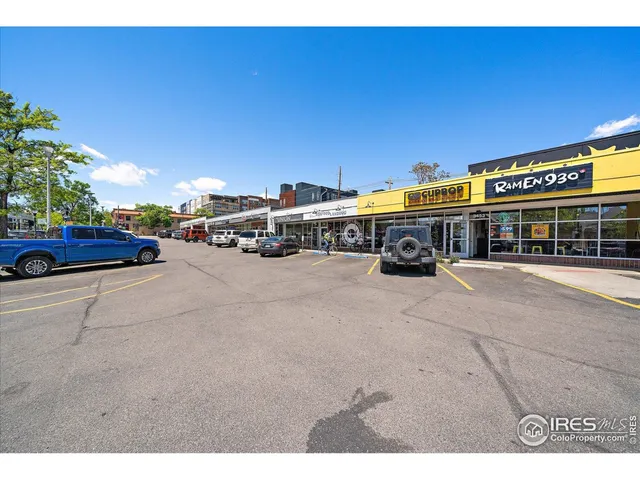 a view of car parked in front of building