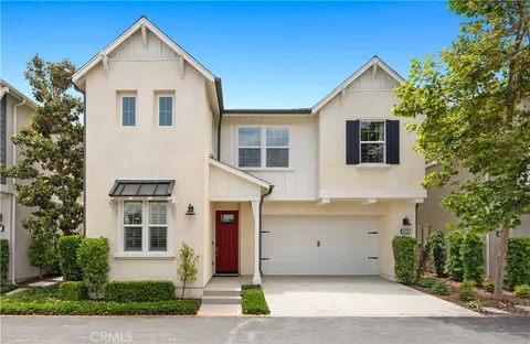 a front view of a house with a garage