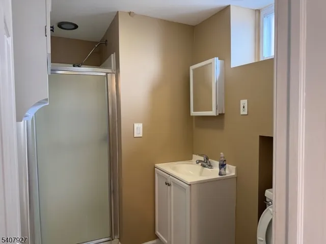 a bathroom with a sink and mirror