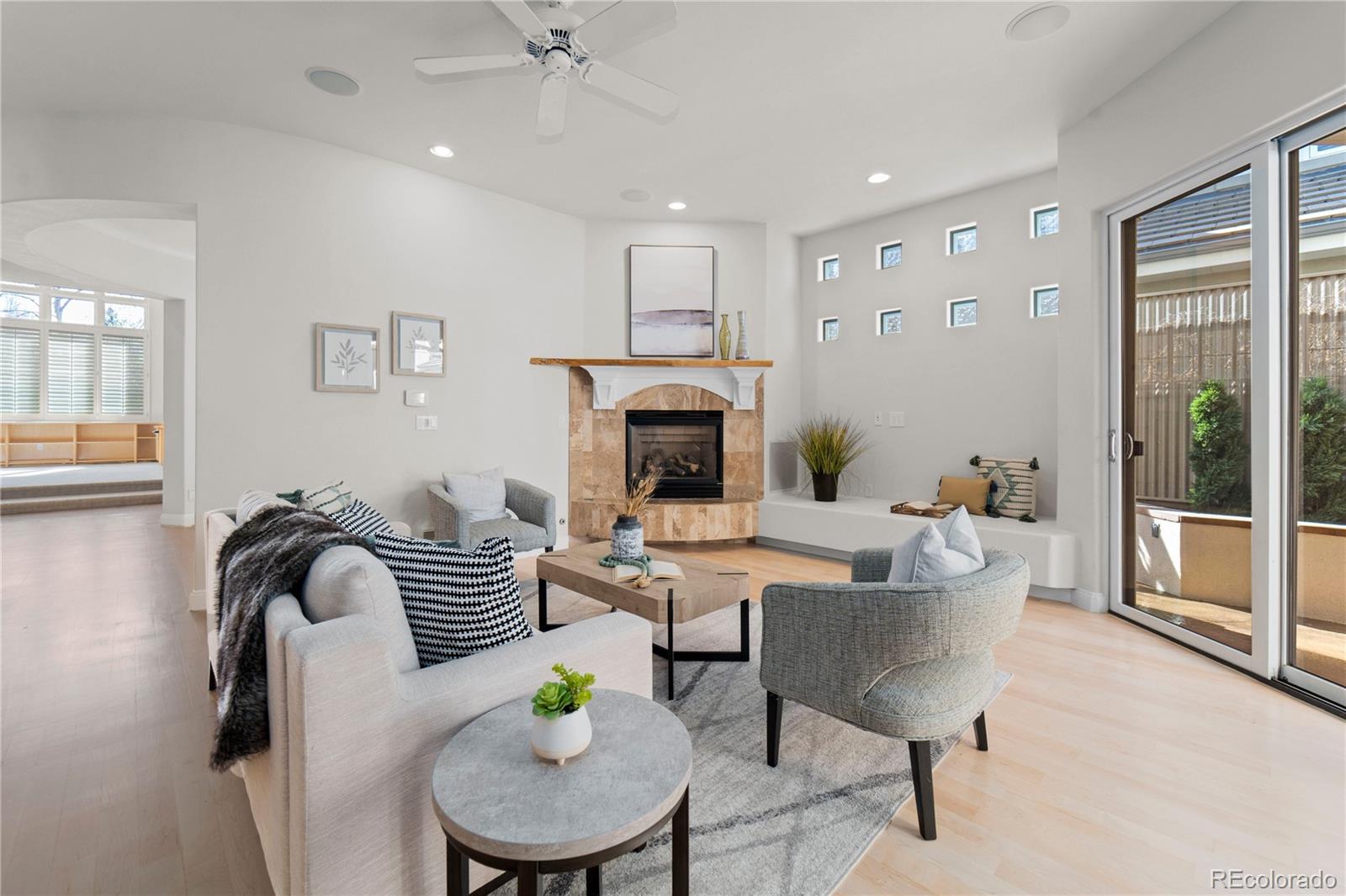 465 Madison Street Denver, CO 80206 - Photo 16 of 40 a living room with furniture and a fireplace
