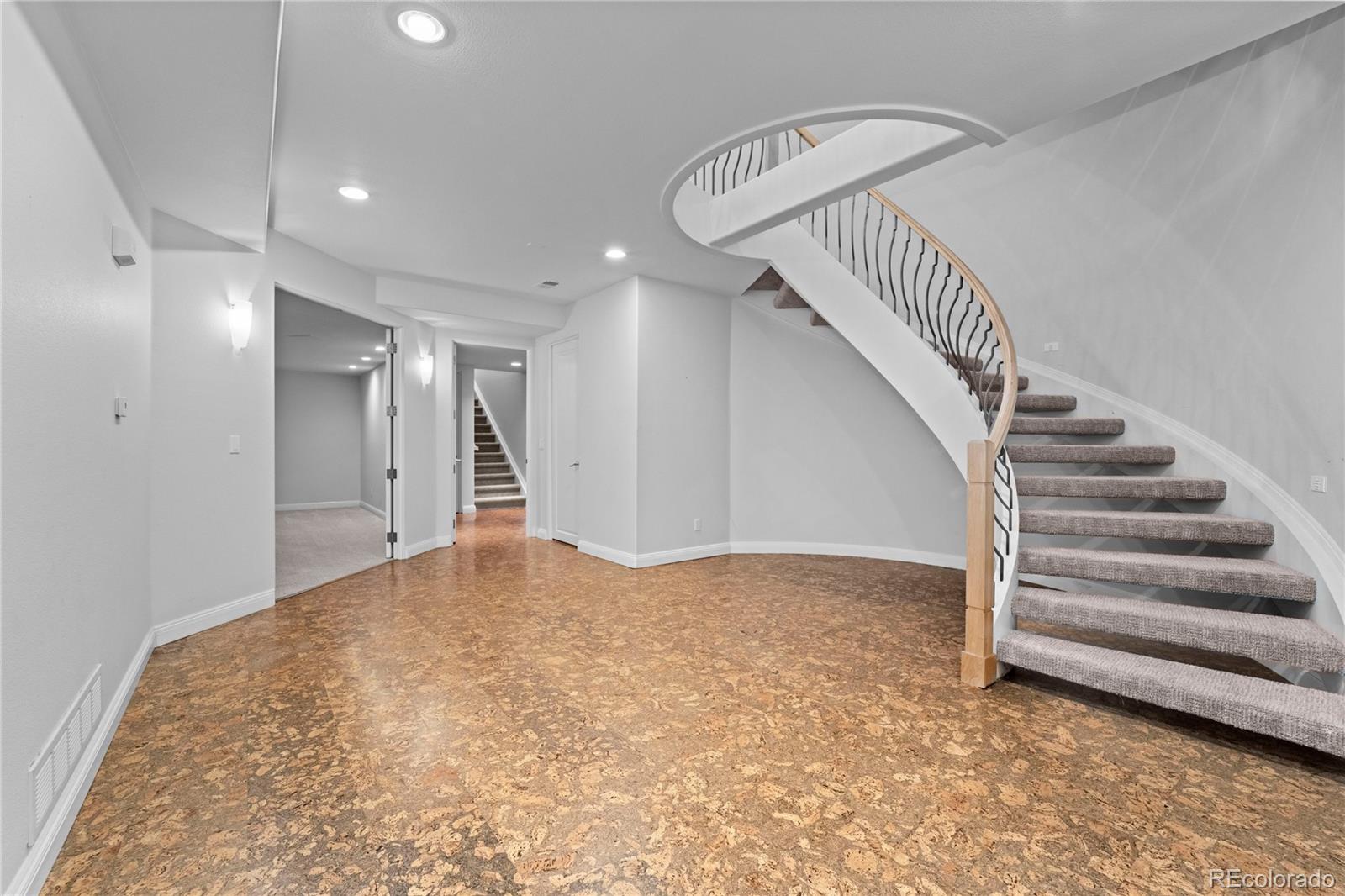 465 Madison Street Denver, CO 80206 - Photo 34 of 40 a view of an empty room with stairs