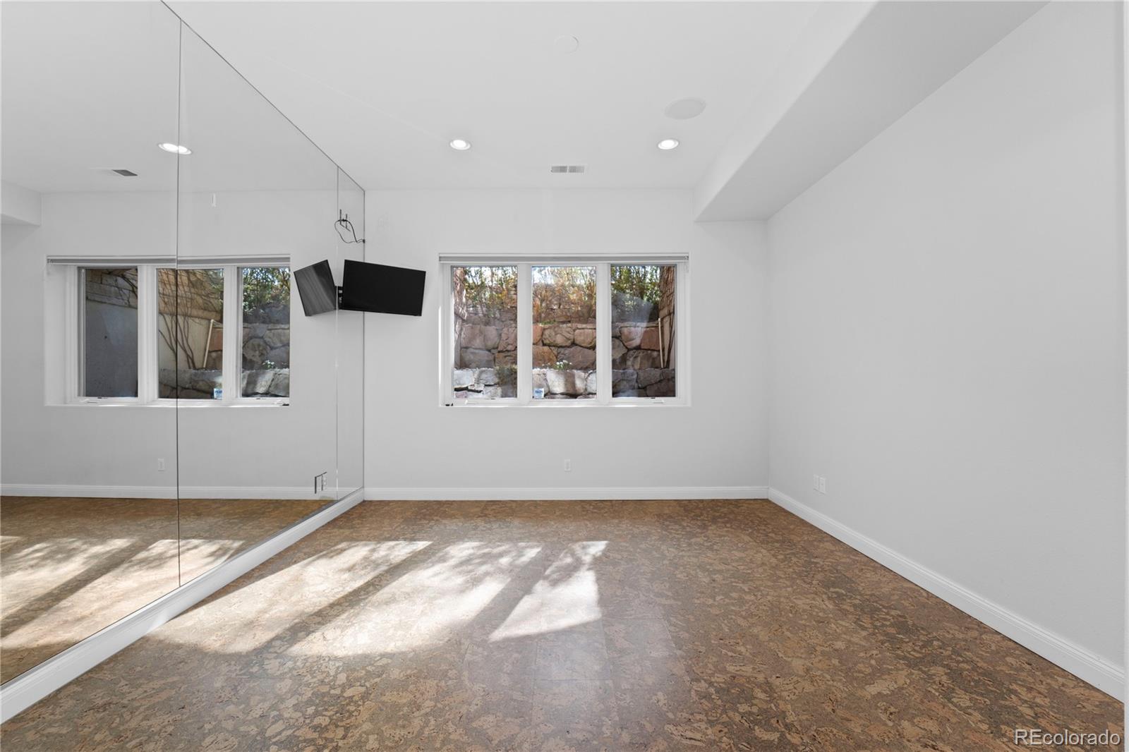 465 Madison Street Denver, CO 80206 - Photo 37 of 40 a view of empty room with a window