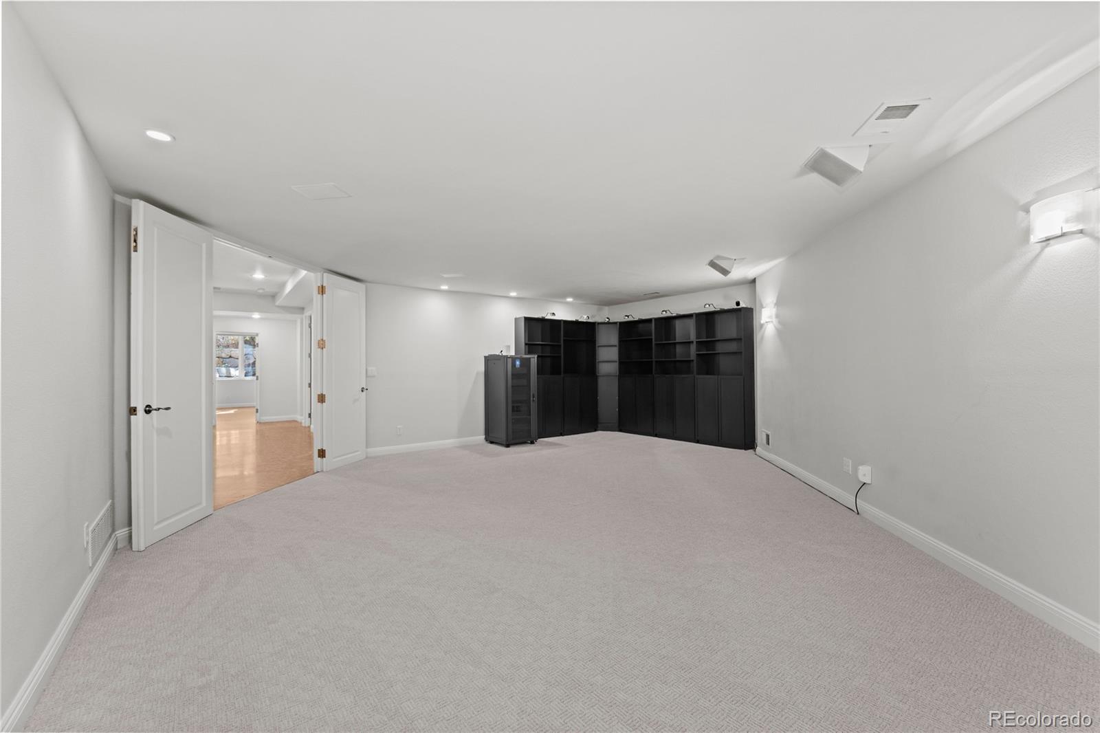 465 Madison Street Denver, CO 80206 - Photo 38 of 40 a big room with closet and windows