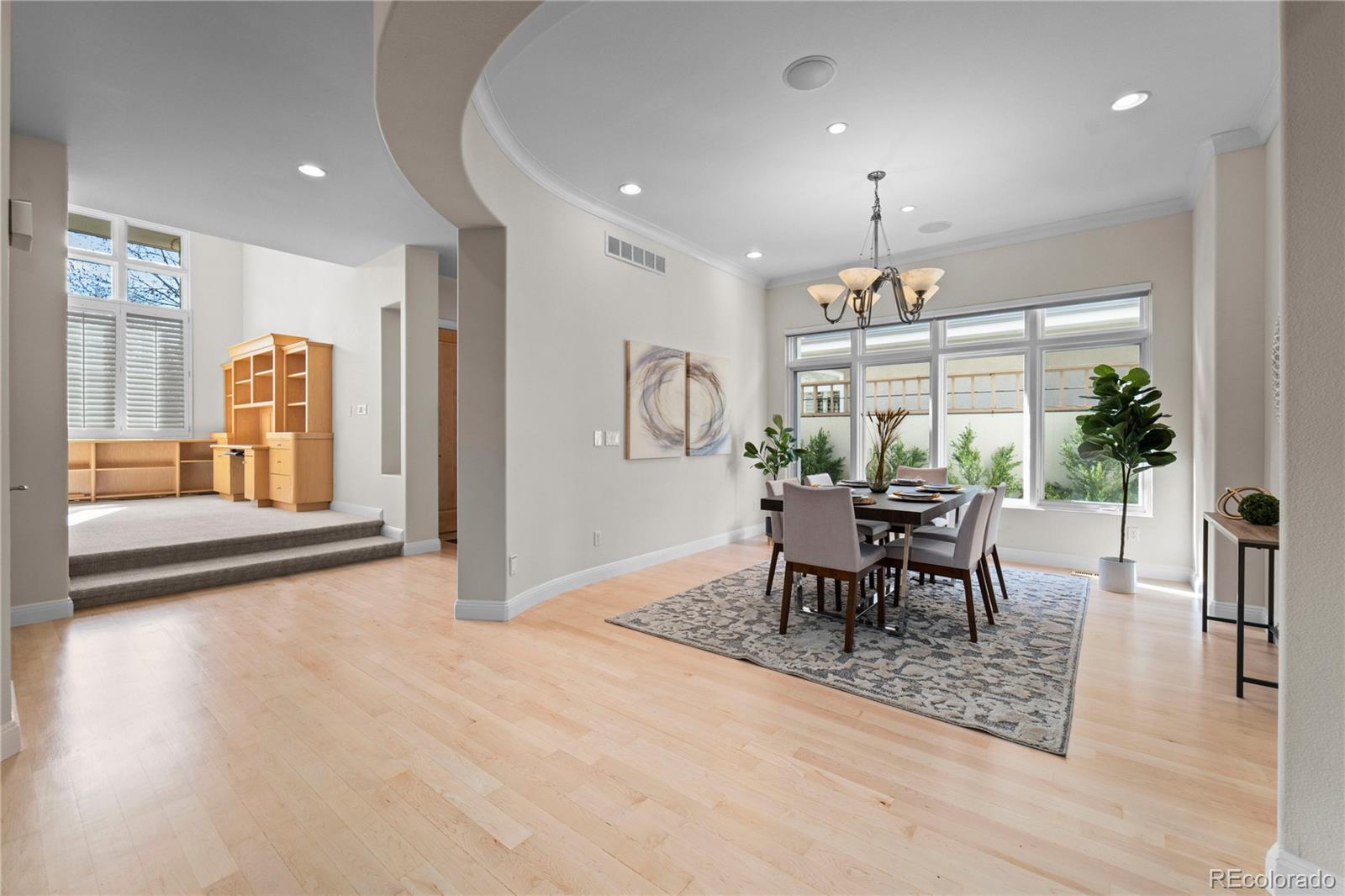 465 Madison Street Denver, CO 80206 - Photo 7 of 40 a dining room with furniture and window