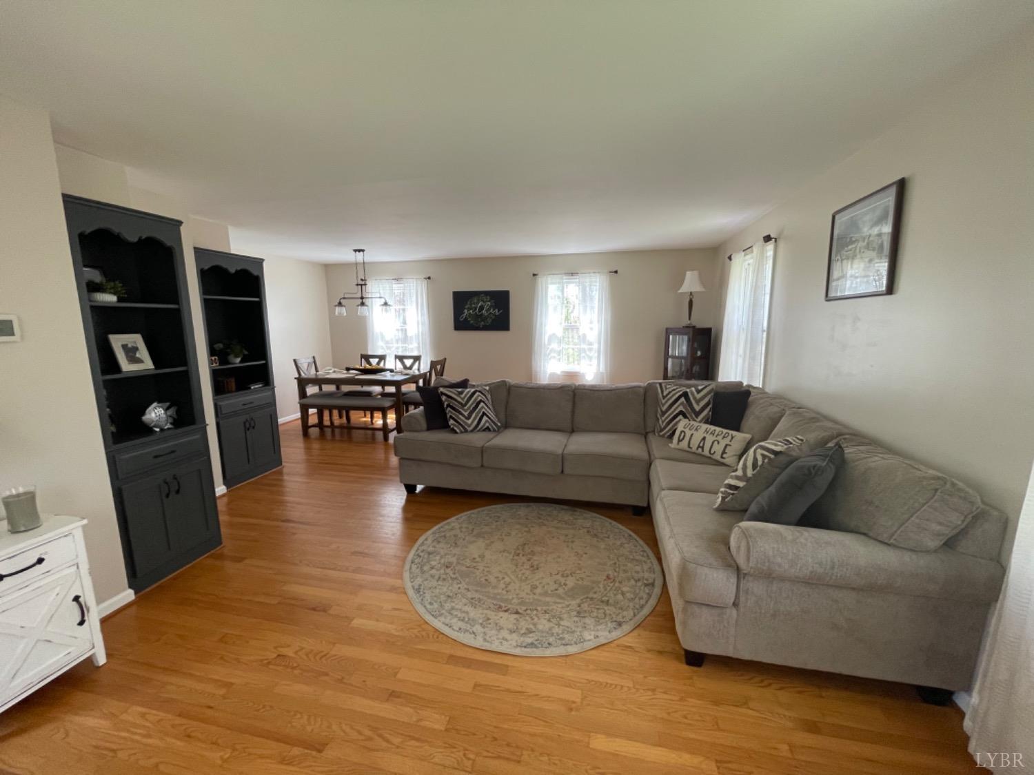 2355 Country Club Road Appomattox, VA 24522 - Photo 18 of 41 a living room with furniture and a flat screen tv