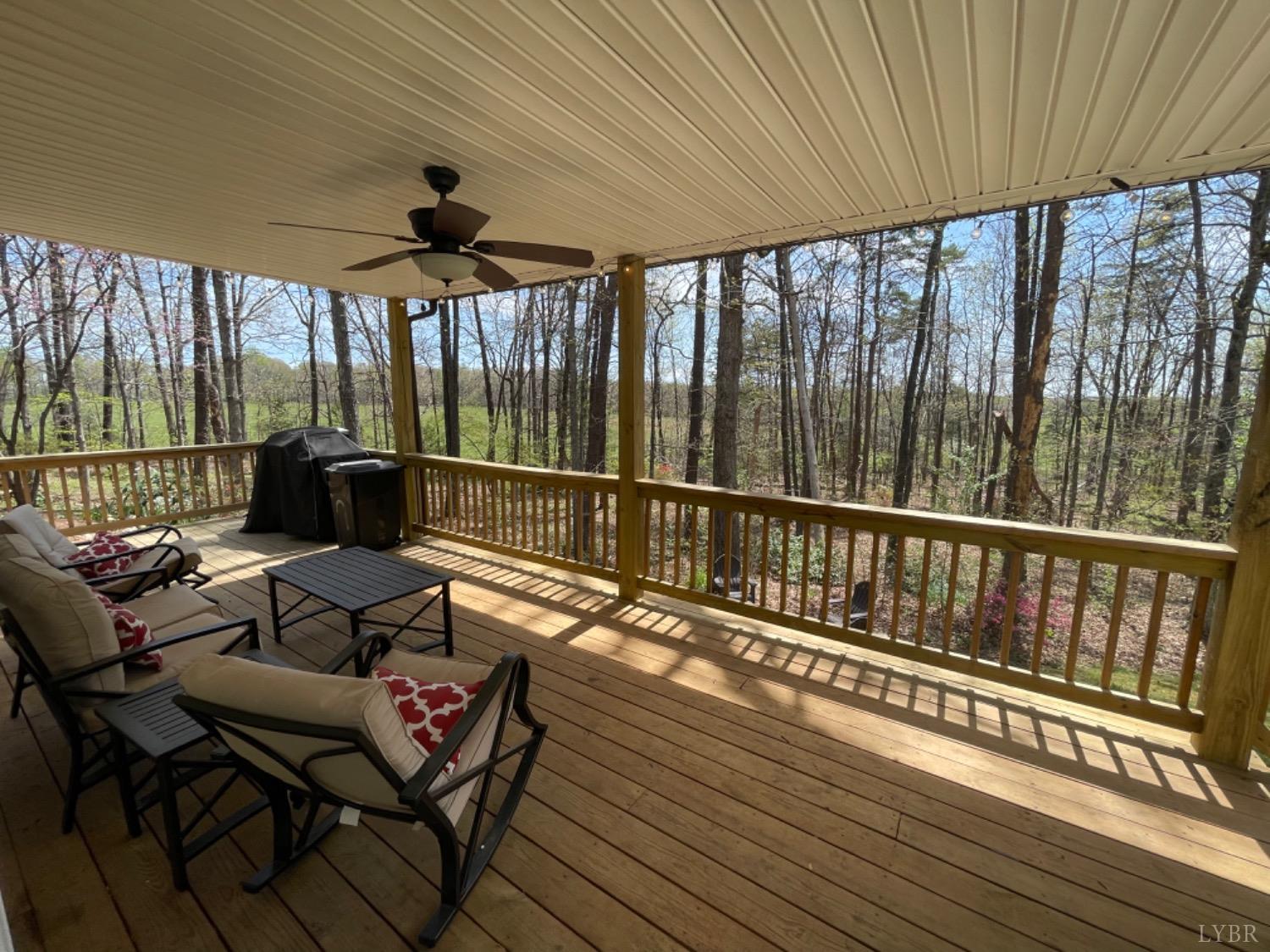 2355 Country Club Road Appomattox, VA 24522 - Photo 28 of 41 a balcony with wooden floor and outdoor seating