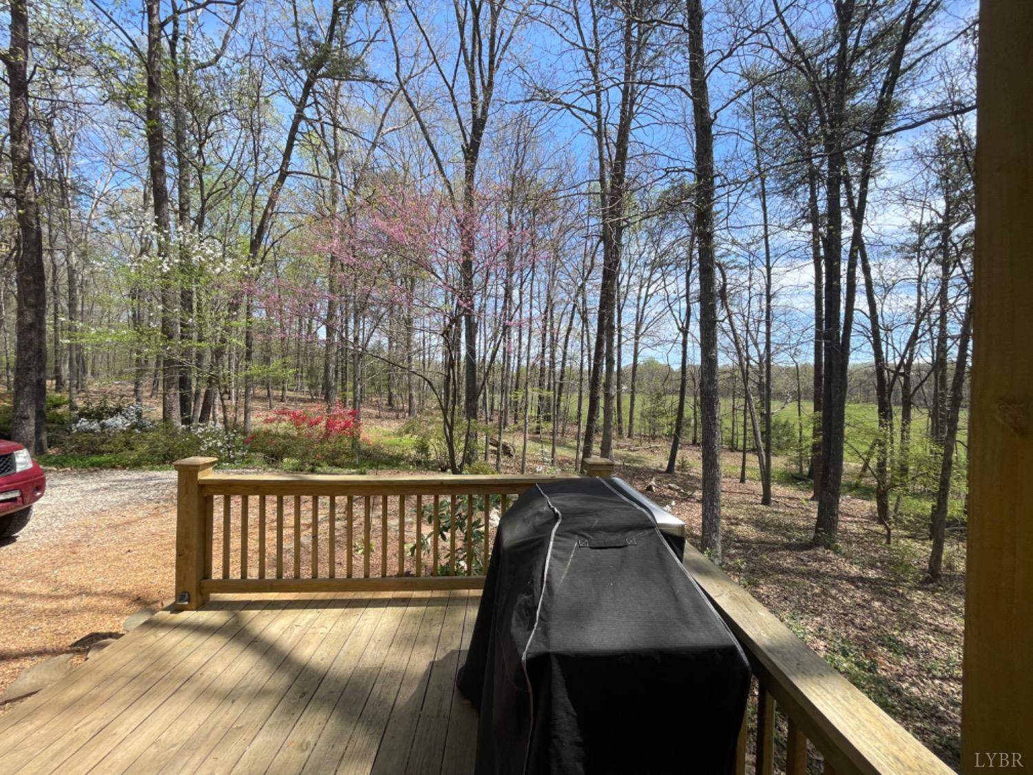 2355 Country Club Road Appomattox, VA 24522 - Photo 31 of 41 a view of a roof deck with couches and wooden fence