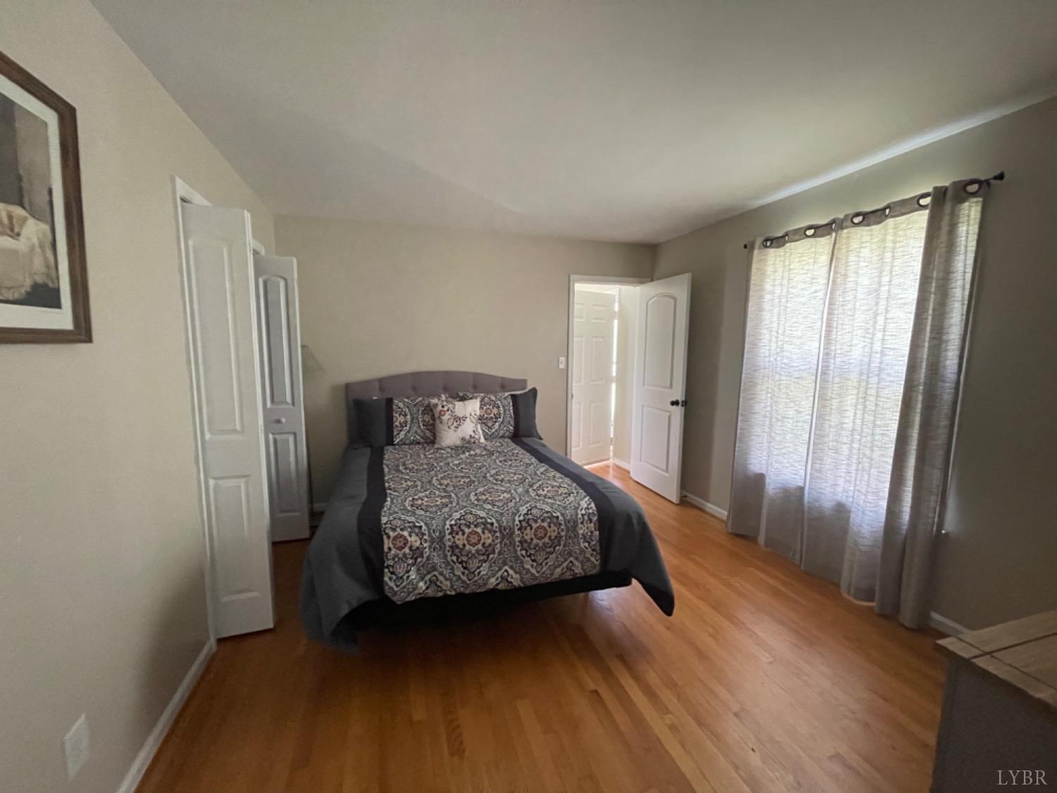 2355 Country Club Road Appomattox, VA 24522 - Photo 33 of 41 a bedroom with a bed and a window
