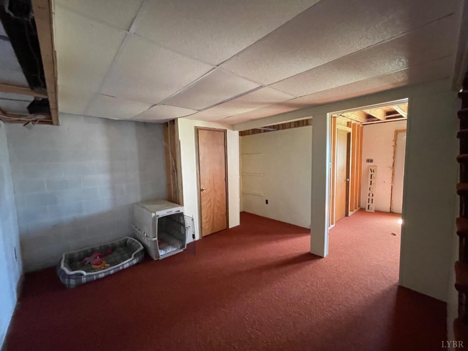2355 Country Club Road Appomattox, VA 24522 - Photo 38 of 41 a room with gym equipment and a mirror