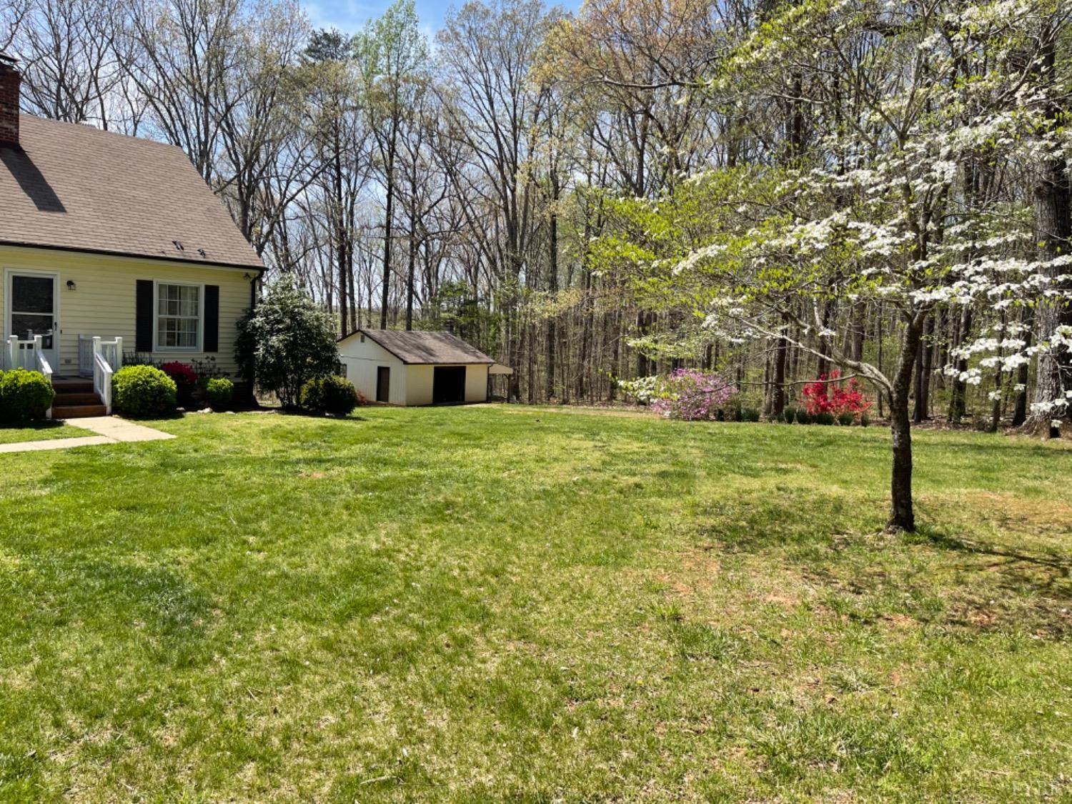 2355 Country Club Road Appomattox, VA 24522 - Photo 6 of 41 a view of a house with a yard and sitting area