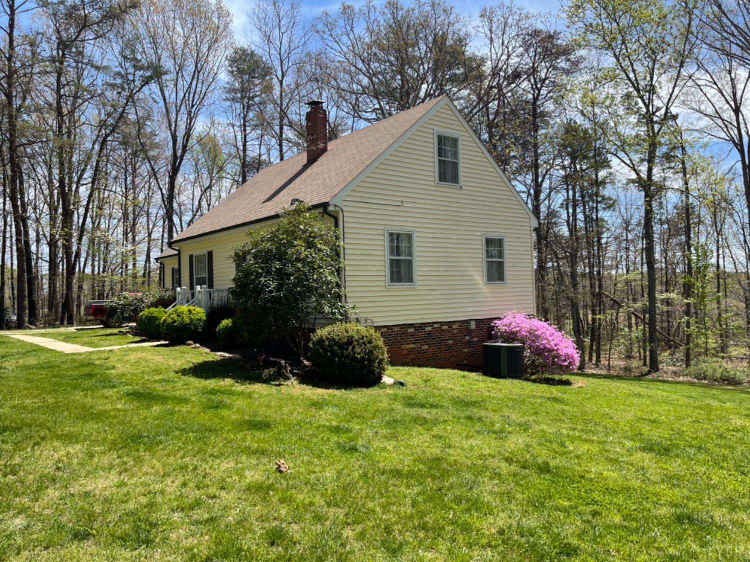2355 Country Club Road Appomattox, VA 24522 - Photo 7 of 41 a front view of house with yard and outdoor seating