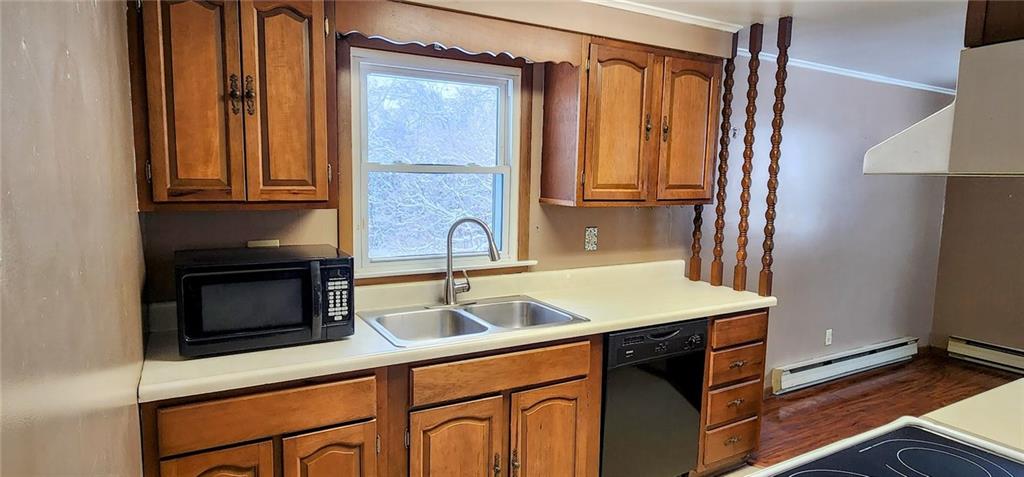 188 Laura Drive Clinton, PA 15026 - Photo 3 of 13 a kitchen with stainless steel appliances granite countertop a sink and a microwave oven