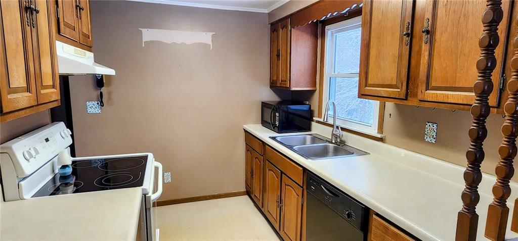 188 Laura Drive Clinton, PA 15026 - Photo 4 of 13 a kitchen with a refrigerator and a sink