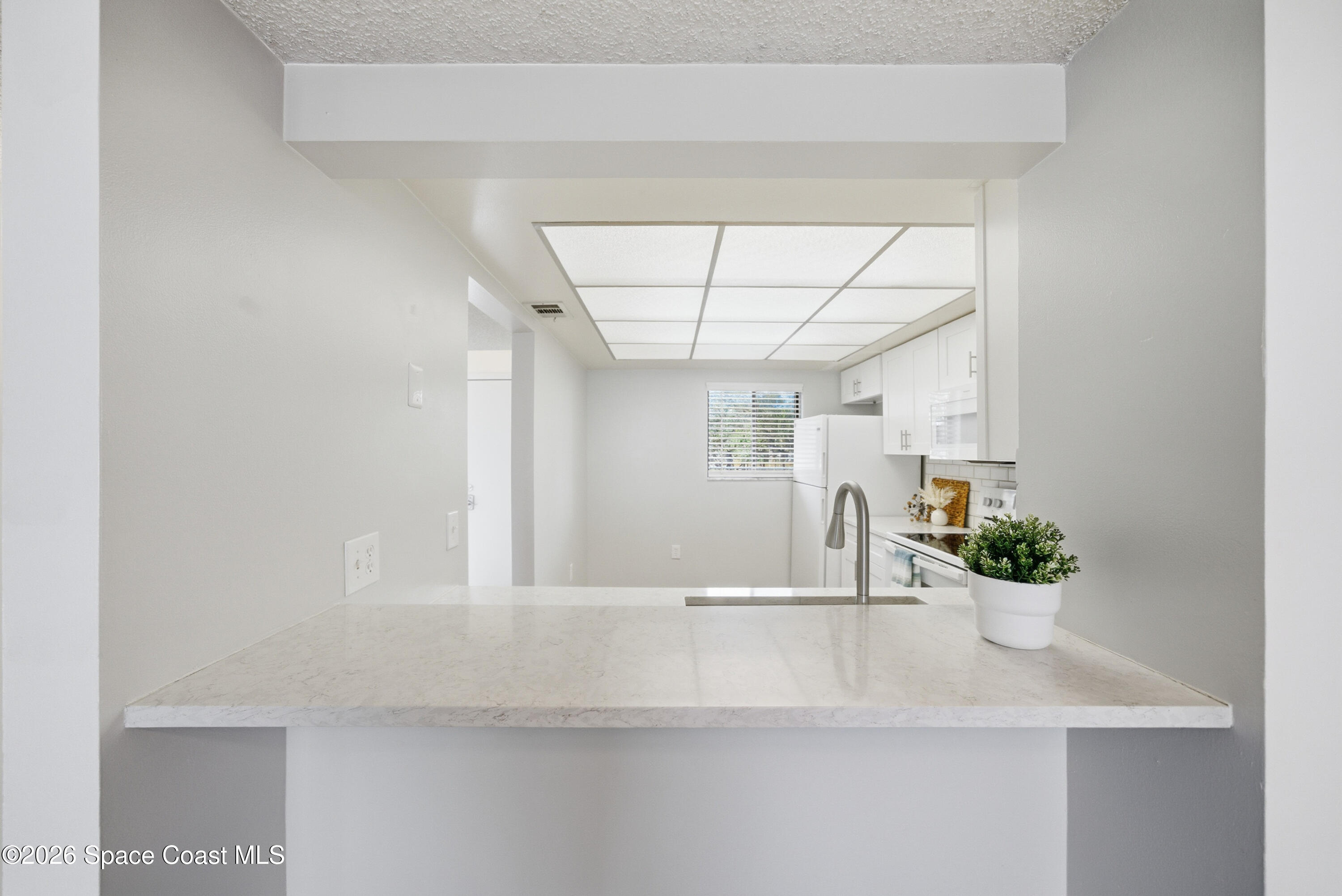 6850 Highway 1, Unit 5204 Grant, FL 32949 - Photo 12 of 33 a bathroom with a sink and a mirror